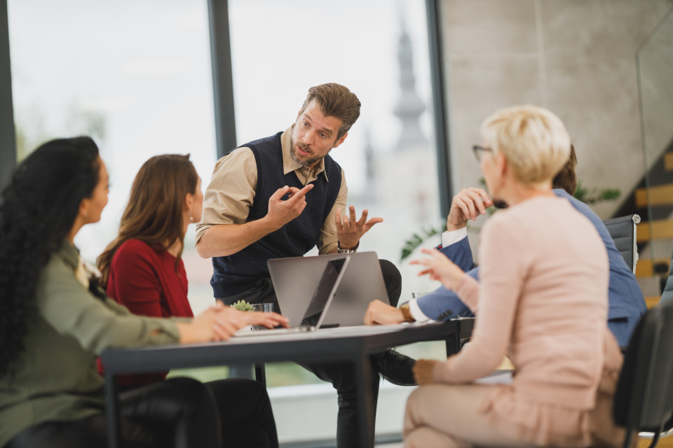 Colleagues in a meeting in a modern office